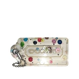 COMING SOON
Coach Poppy Confetti Hang Tag